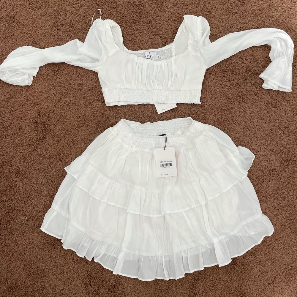 Hello Molly. Size Small. Perfect for a Bride to Be, Vacation. Never worn.